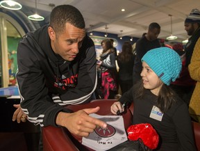 Jama Mahlalela at a Raptors clinic