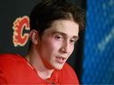 Samuel Honzek talks with the media during a prospects training camp in Calgary last month.