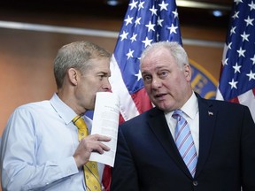 FILE--Rep. Jim Jordan, R-Ohio, left, and Rep. Steve Scalise, R-La., confer during a news conference at the Capitol in Washington, Wednesday, June 8, 2022. The two GOP leaders have emerged as contenders to replace former House Speaker Kevin McCarthy who was voted out of the job by a contingent of hard-right conservatives. Jordan is now chairman of the House Judiciary Committee and a staunch ally of former President Donald Trump. House Majority Leader Steve Scalise, R-La., has long sought the top post.