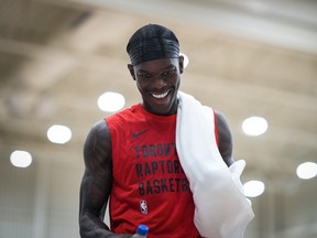 Toronto Raptors point guard Dennis Schroder smiles as he walks off the court after a practice session during the opening day of the NBA basketball team's training camp, in Burnaby, B.C., on Tuesday October 3, 2023.