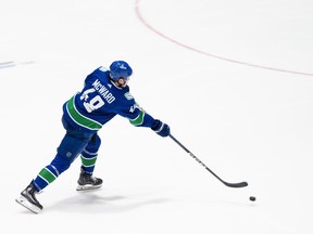 Vancouver Canucks' Cole McWard (48) takes a shot on goal against the Seattle Kraken during the second period of preseason NHL action in Abbotsford, B.C. on Wednesday, Oct. 4, 2023.