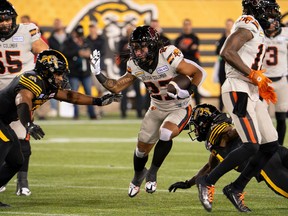 B.C. Lions running back JaQuan Hardy (27) runs against the Hamilton Tiger-Cats during first half CFL football game action in Hamilton, Ont. on Friday, October 13, 2023.