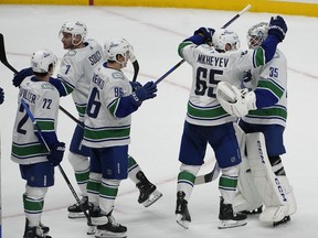 After six games the Vancouver Canucks are in a much happier place this NHL season than they were at the same time last year. Vancouver Canucks goaltender Thatcher Demko (35) is congratulated by right wing Ilya Mikheyev (65) after the team's 3-2 win against the Nashville Predators after an NHL hockey game, in Nashville, Tenn.,&ampnbsp;Tuesday, Oct. 24, 2023.
