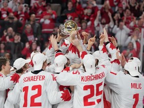 Team Canada lifts the IIHF Championship Cup while celebrating winning over Czechia at the IIHF World Junior Hockey Championship gold medal game in Halifax on Thursday, January 5, 2023.