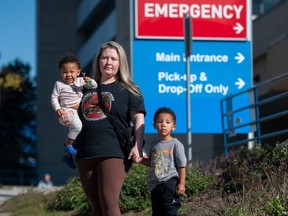 Mariam with two of her children at Royal Columbian hospital in New Westminster.