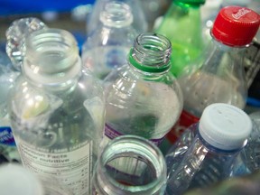 Give us a break and use an adhesive that is eco-friendly and will actually come off a glass bottle without hours of prep for the recycling bin writes Robert Tritschler
