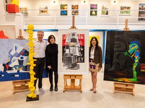 From left: Tom Gautreau, Angela Grossmann and Carol Lee with art donated to the Vancouver Chinatown Foundation for the 58 West Hastings social housing project. From left: art by Doug Coupland, Martha Sturdy, Grossman and Lawrence Paul Yuxweluptun.