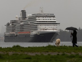The Holland America cruise ship leaves Burred Inlet in Vancouver as the last cruise ship of the season, as seen from Ambleside Park in West Vancouver, BC, October 24, 2023.