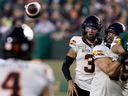 B.C. Lions quarterback Vernon Adams Jr. passes to Keon Hatcher during CFL action against the Elks at Commonwealth Stadium in Edmonton on Sept. 22.