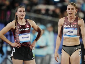 Canada's Grace Konrad, left, and Madeline Price react following the women's 400m hurdles final at the Pan American Games, in Santiago, Chile, Wednesday, Nov. 1, 2023.