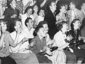 Fans watch Bill Haley and the Comets in concert at the Kerrisdale Arena on June 27, 1956.