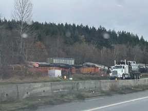 A train derailed alongside Highway 91 in Delta, B.C., on Nov. 19, 2023