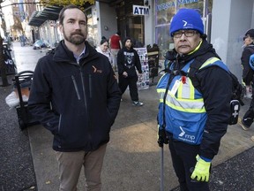 Mission Possible Executive Director Matt Smedley (left) and MP Neighbours Lead Patroller Gordon Bird in the DTES Wednesday, Nov. 15. Mission Possible is a non-profit that operates a program called MP Neighbours that is a community patrol that addresses safety and security and provides community outreach in the DTES.
