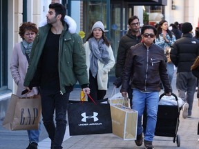 Black Friday shoppers at McArthurGlen outlet mall in Richmond. The mall was busy despite competition from e-commerce sites.