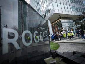 Nearly 300 Rogers Communications workers have voted strongly in favour of a new contract, ending a company lockout that began two weeks ago.