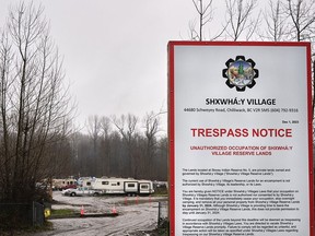 A trespass notice posted at the entrance to the unsanctioned encampment outside of Island 22 regional park in Chilliwack, on Dec. 10, 2023. Residents of the encampment have been given until Jan. 31, 2024 to leave.