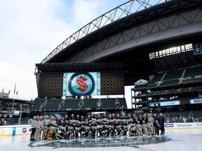 The Seattle Kraken pose for a team picture during practice before the Discover NHL Winter Classic at T-Mobile Park on December 31, 2023 in Seattle, Washington.