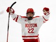 Boston University defenceman Aiden Celebrini (22) reacts after a goal during the second period of an NCAA hockey game against Massachusetts on Friday, Oct. 27, 2023, in Boston.