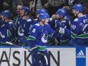 Canucks winger Sam Lafferty celebrates his first-period goal against the Hurricanes on Saturday at Rogers Arena.
