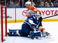 Philadelphia Flyers' Joel Farabee (86) scores on Vancouver Canucks goaltender Casey DeSmith (29) during the second period of an NHL hockey game in Vancouver, on Thursday, Dec. 28, 2023.