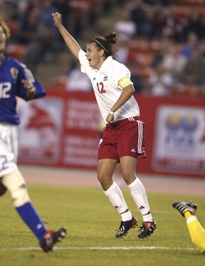 Edmonton: Aug. 20, 2002. Canada's Christine Sinclair celebrates her first goal of the game against Japan at Commonwealth Stadium during FIFA U-19 Women's World Soccer Championships action.