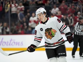 Chicago Blackhawks center Connor Bedard (98) plays against the Detroit Red Wings in the third period of an NHL hockey game Thursday, Nov. 30, 2023, in Detroit. Bedard has been named the NHL's rookie of the month for November.THE CANADIAN PRESS/AP-Paul Sancya