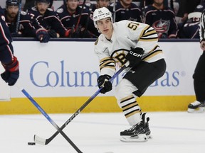 Boston Bruins' forward Matthew Poitras handles the puck against the Columbus Blue Jackets during an NHL game Monday, Nov. 27, 2023, in Columbus, Ohio. Team Canada is adding a big piece to its roster for the upcoming world junior hockey championship. Poitras is joining Canada's world junior team as it looks to defend its gold medal in Gothenburg, Sweden.THE CANADIAN PRESS/AP/Jay LaPrete