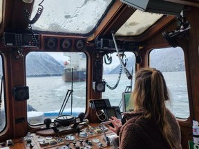 Hailey McIntyre, captain of what is believed to be the first all-woman tugboat crew in B.C., on a trip from Prince Rupert to Stewart for SAAM Towage in December 2023.