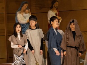 Children perform in a Korean-language recreation of the birth story of Jesus at St. Andrew Kim Catholic church in Surrey, which has 4,700 members. (Dec. 16, 2023.