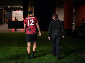 Canada's Christine Sinclair walks to the locker room after Canada defeated Australia 1-0 in her final international soccer match, in Vancouver, on Tuesday, December 5, 2023. When one door closes, another opens. Sinclair may now be retired from international football, but she is ramping up her foundation, "dedicated to inspiring and empowering girls with goals."