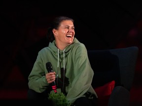 Canada's national women's soccer team captain Christine Sinclair laughs while speaking during a celebration for her retirement in Vancouver on Wednesday, Dec. 6, 2023.