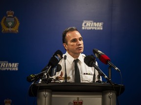 Winnipeg police Chief Danny Smyth says a man considered to be a person of interest in the homicide of a B.C. truck driver was shot and killed by officers.