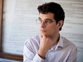 Writer Steven Galloway is pictured in his office at the University of B.C. in Vancouver on March 31, 2014.