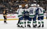 The Vancouver Canucks celebrate a goal by Brock Boeser in the first period against the Pittsburgh Penguins at PPG PAINTS Arena on January 11, 2024 in Pittsburgh, Pennsylvania.