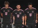 Teammate Benjamin Kremaski (left) wears a new uniform featuring the Royal Caribbean International logo during an event on the world's largest cruise ship, Icon of the Seas, in Miami on January 23. , Inter Miami's Lionel Messi (centre) alongside Luis Suarez and others. Messi and his team visited Vancouver on May 25th.