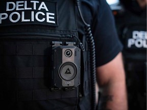 Delta Police officer wearing a body camera.