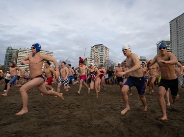 Photos: The 2024 Polar Bear Swim at English Bay and elsewhere in