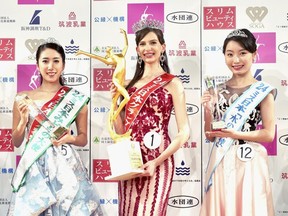 Contestants including Carolina Shiino, who won the Miss Nippon Grand Prix, centre, pose for a photo after the contest in Tokyo, Monday, Jan. 22, 2024.