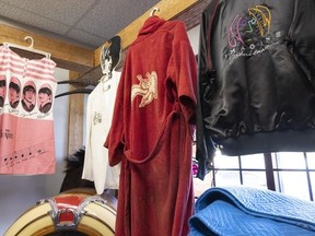 A red housecoat that belonged to the late Led Zeppelin drum John "Bonzo" Bonham sold for over $20,000 at a Vancouver area auction Jan. 30. The logo on the back is for Swan Song, Led Zeppelin's record company.