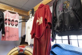 A red housecoat that belonged to the late Led Zeppelin drum John "Bonzo" Bonham sold for over $20,000 at a Vancouver area auction Jan. 30. The logo on the back is for Swan Song, Led Zeppelin's record company.