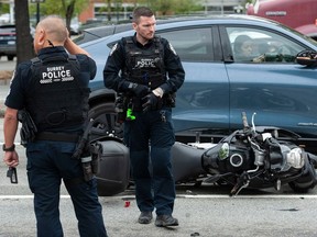 Surrey Police Service officers at the scene of a traffic accident.
