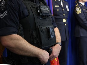 A Delta Police officer demonstrates a body-worn camera during a press conference held by the British Columbia Association of Chiefs of Police in Surrey on Jan. 11, 2024.