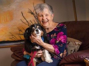 Mardi Dennis with her dog Charlotte at their home in New Westminster.