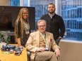 CEO Michael Bryant (front) and navigators including Kelly Davies (left) and Jean Reyes at the Legal Aid B.C. offices in Vancouver.