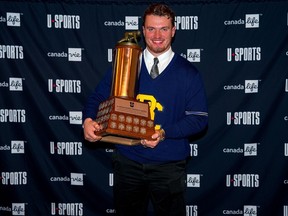 Theo Benedet wins the J.P. Metras Trophy at the 2023 USports Football Awards in Kingston, Ont., on Thursday, November 23, 2023. The towering six-foot-seven, 305-pound offensive lineman from the University of British Columbia moved up one spot to No. 2 on the CFL Scouting Bureau's winter edition of the top-20 prospects for the 2024 draft.