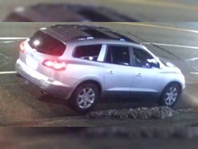 Homicide police have released surveillance images of a silver 2010 Buick Enclave that was seen fleeing the site of a fatal shooting in the 5500-block of Kingsway Avenue, Burnaby, B.C. on Jan. 23, 2024. Police are asking the public to keep an eye out for the vehicle, as well as suspect Johnson Viet, Anh Do, a 25-year-old Surrey man.