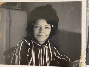 A woman who may be Thelma Dueck in a photo from an album recovered by New Westminster police.