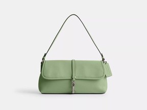 The Hamptons shoulder bag, originally released in 2003, features a silver clasp closure with a smooth-and-supple leather that earns major cloud-candy vibes thanks to this sweet pistachio shade.