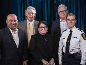 Today's panel (from left): RCMP Chief Superintendent David Teboul, host Stuart McNish, Postmedia crime reporter Kim Bolan, anti-terrorism consultant Calvin Chrustie, and Vancouver Police Deputy Chief Fiona Wilson. Delta Police Chief Neil Dubord also appeared via video link.