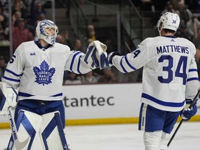 Toronto Maple Leafs centre Auston Matthews (34) celebrates with goaltender Ilya Samsonov after scoring against the Arizona Coyotes Wednesday, Feb. 21, 2024, in Tempe, Ariz.